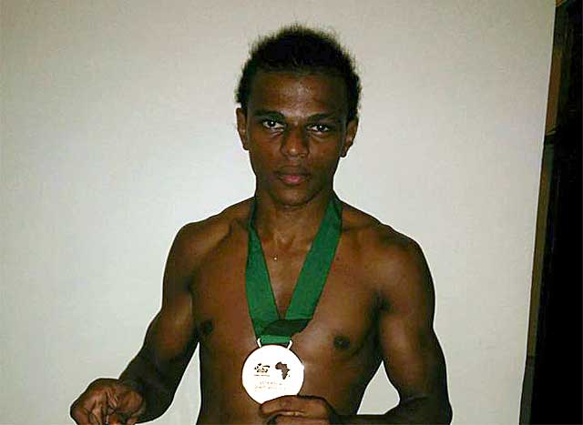 Victory: Andrique Allisop with the bronze medal he won in Cameroon