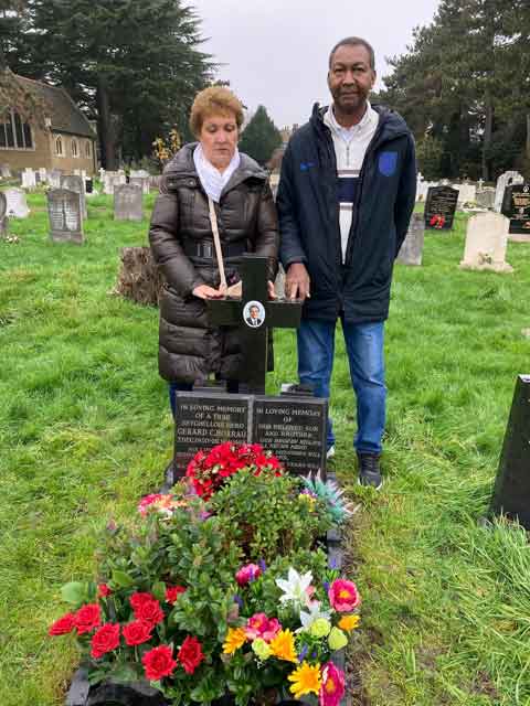 Sadness: Lewis and Juliana Betsy pay their respects at Gerard’s grave in West London