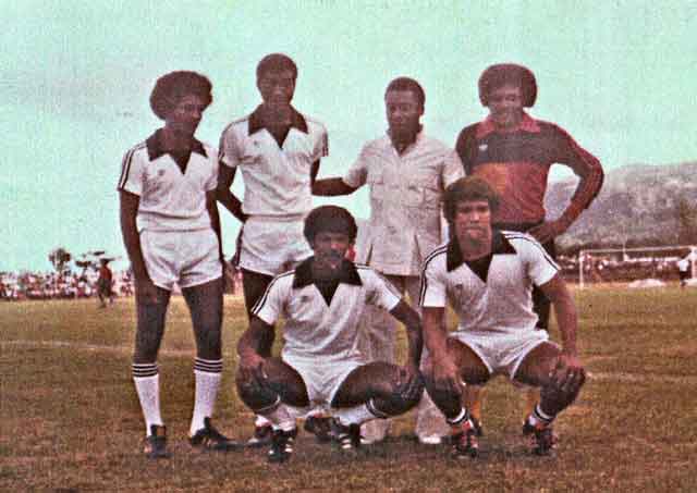 Meeting a legend: Lewis Betsy and Pele, centre back, with other players in Seychelles at a charity match in February 1979