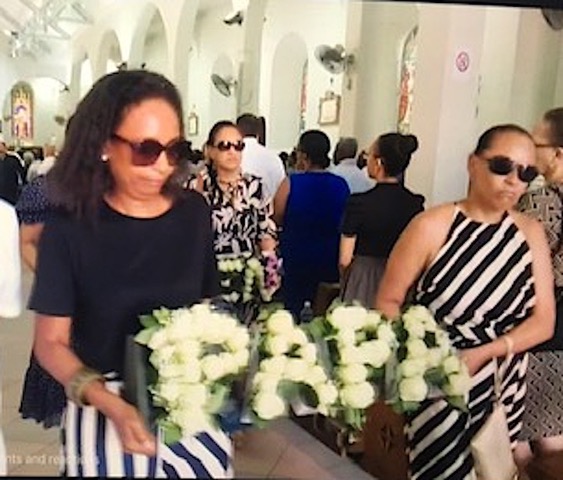 Loving tribute: Noel’s daughters Ina and Helda at the funeral service as streamed from Seychelles