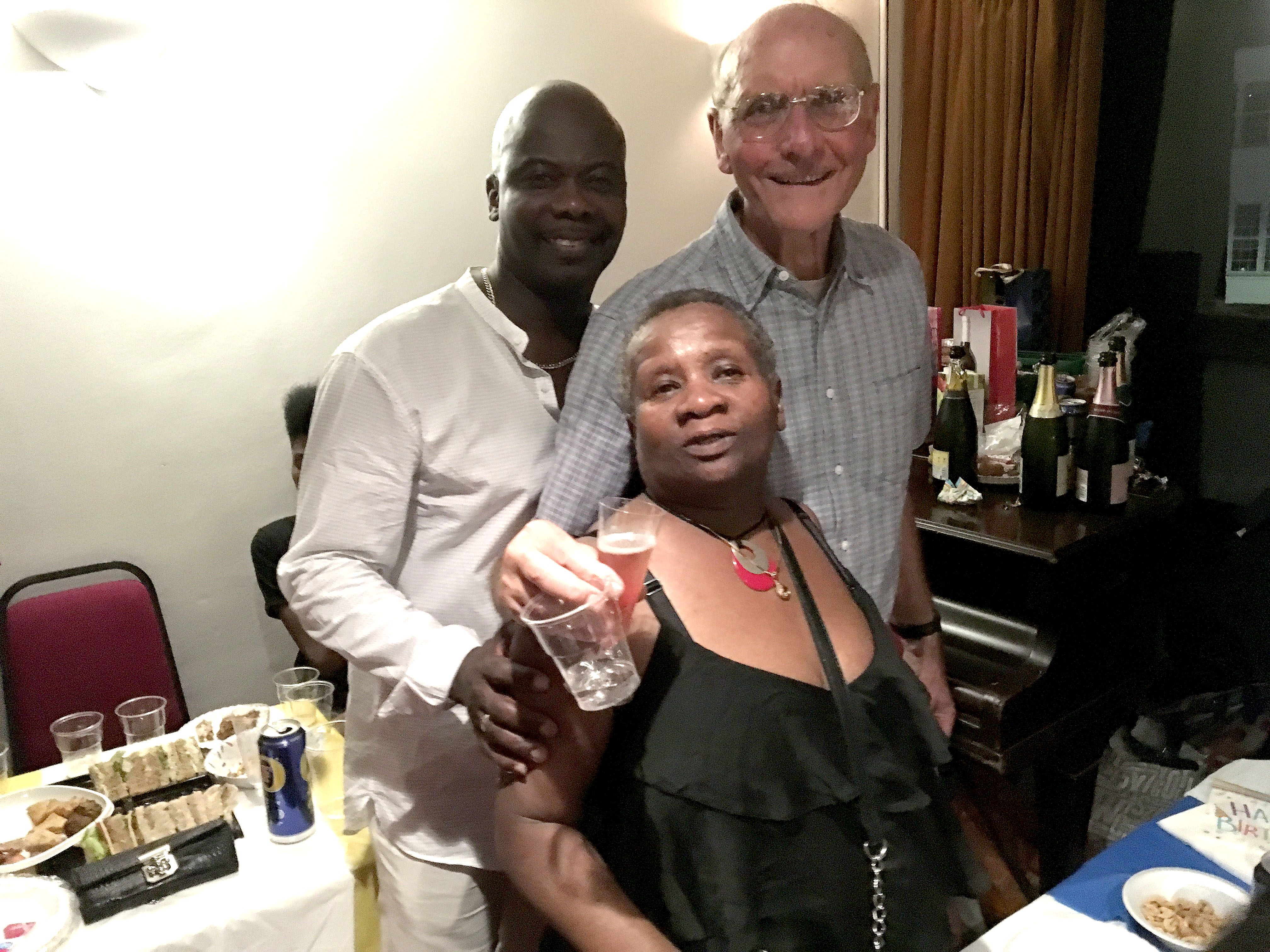 Happy: Maurice Bolwell, who celebrated his 80th birthday, pictured with his wife and friend