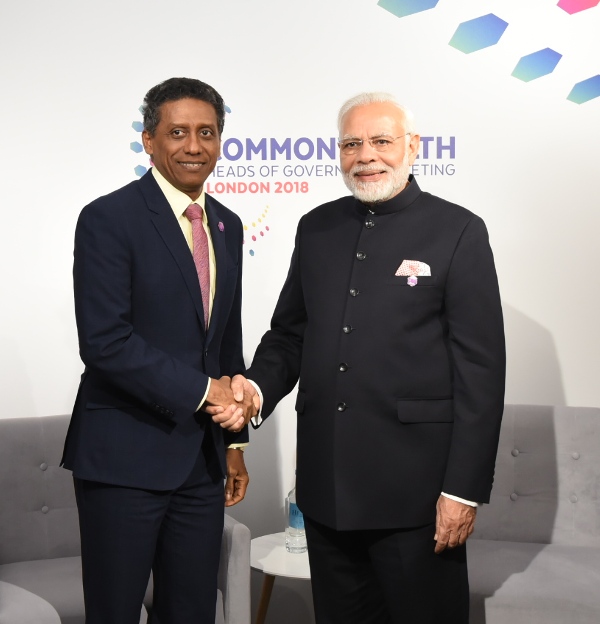 Handshake: Mr Faure and Narendra Modi, Prime Minister of India