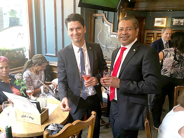 Message: High Commissioner Derick Ally with Terry Romain