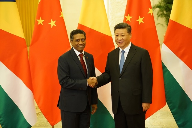 Working together: Danny Faure and President Xi Jinping             Photo: Courtesy of SNA