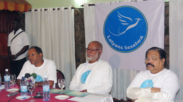 Announcement: Amed Afif, Secretary General, far left, Pat Pillay, Leader, and Dr V Ramadoss, Treasurer.