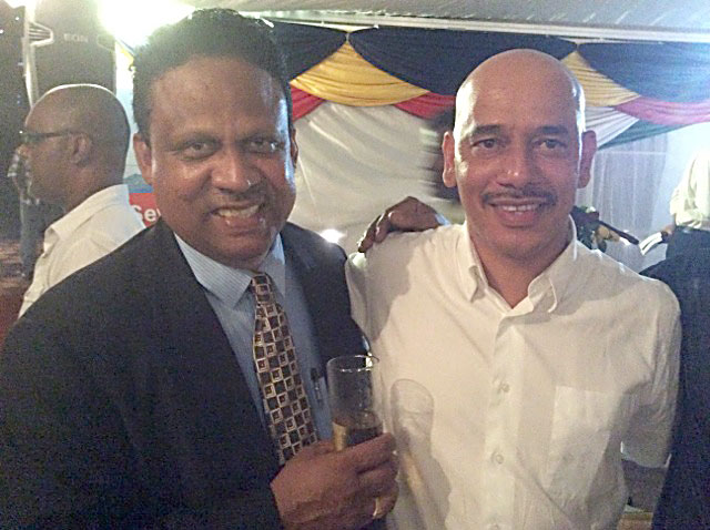 Friends of Sir James: Nichol Gabriel (left) and Leader of the Opposition, the Hon David Pierre.