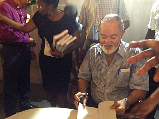 Popular: Sir James signing copies of his book at the launch party