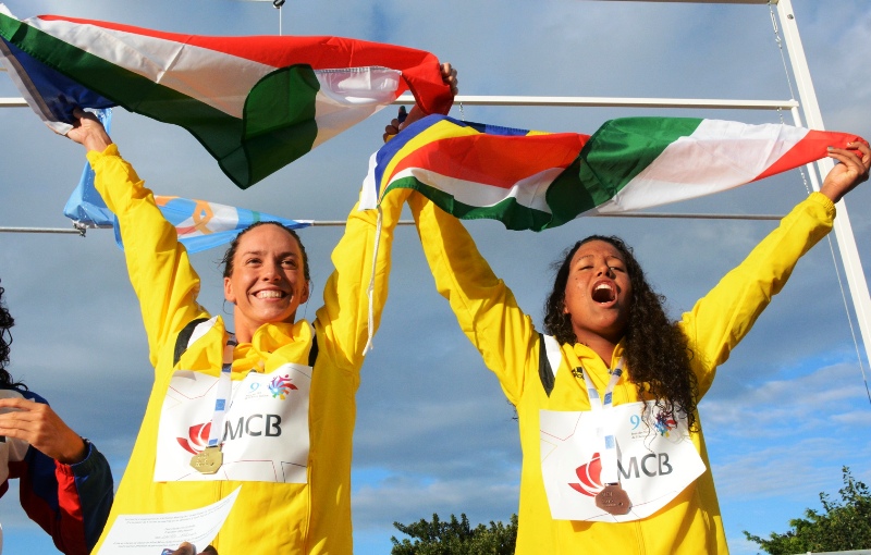 All smiles: Female lifters Ruby Malvina and Clementina Agricole each won three gold medals, while Alexus Laird won the women’s 50m backstroke in a record 29.48 seconds